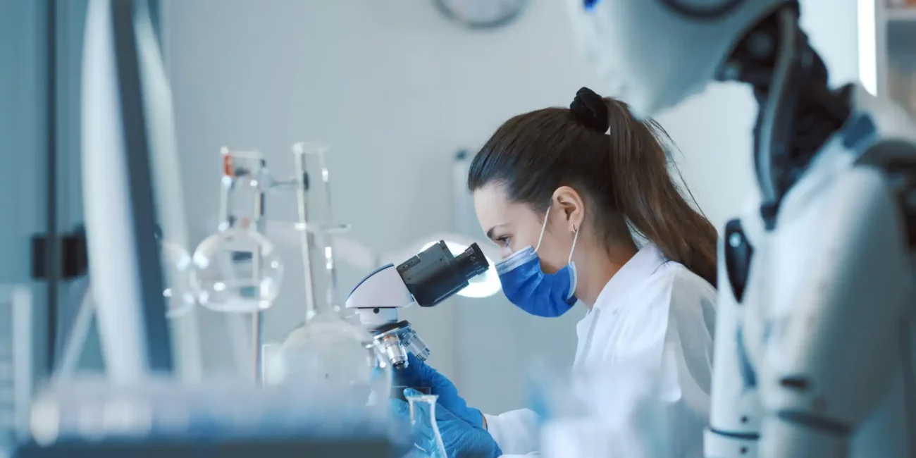 Scientist and humanoid AI robot in the science lab